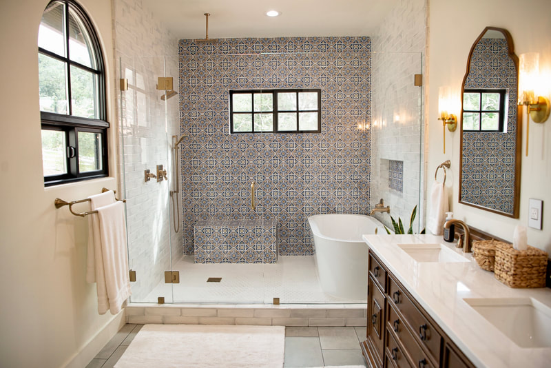 Spanish Revival Bathroom with free standing tub in the shower area